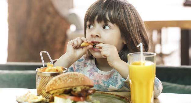 girl eats fast food