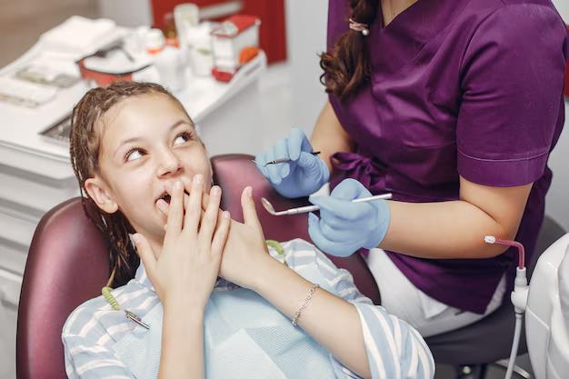 girl sitting dentist office